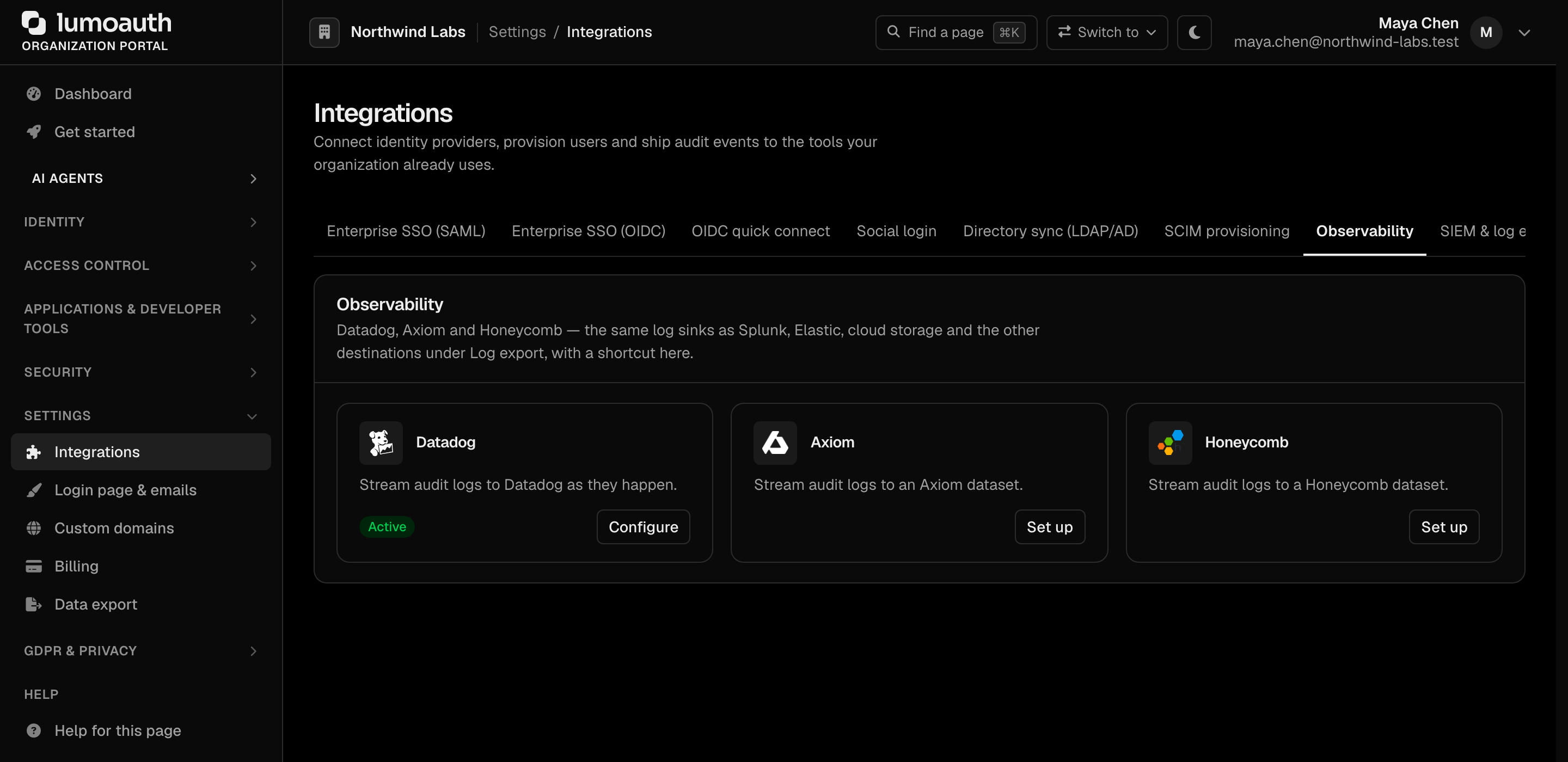 The Observability section of the Integrations page with the Datadog, Axiom and Honeycomb cards