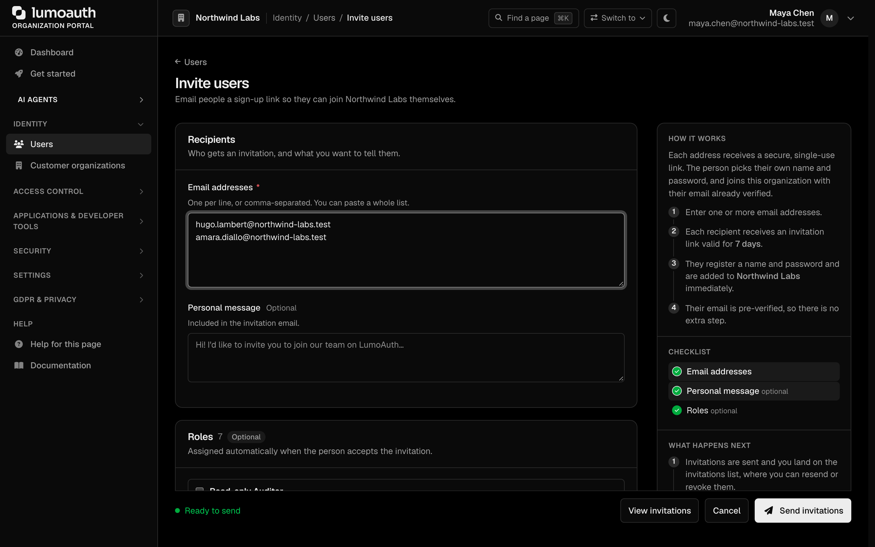 The Invite users page with two email addresses entered and the Send invitations button