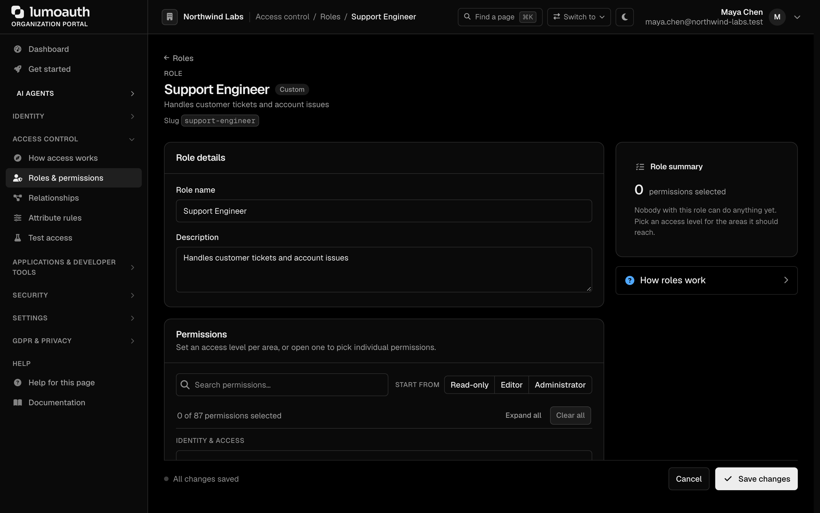 A custom role opened for editing, with its details, role summary and permission picker